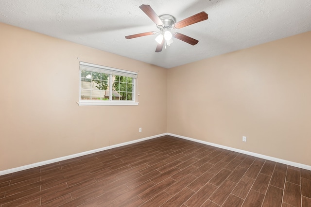 spare room with ceiling fan and a textured ceiling