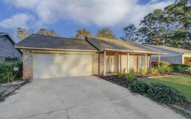 single story home with a garage