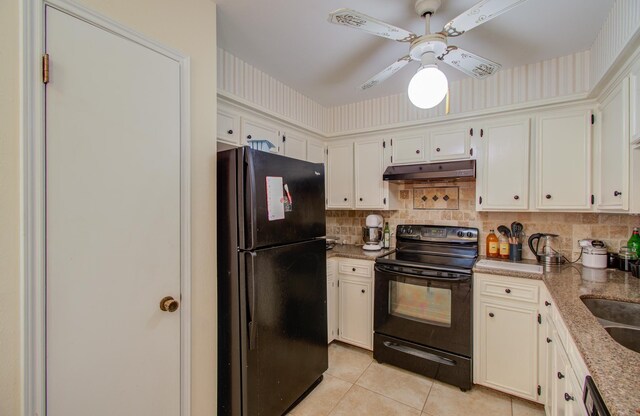 kitchen featuring ceiling fan, white cabinets, black appliances, and light tile patterned floors