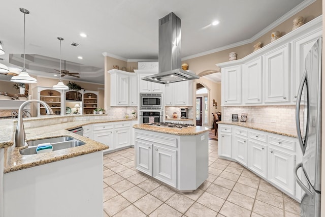 kitchen featuring sink, hanging light fixtures, white cabinetry, island exhaust hood, and stainless steel appliances