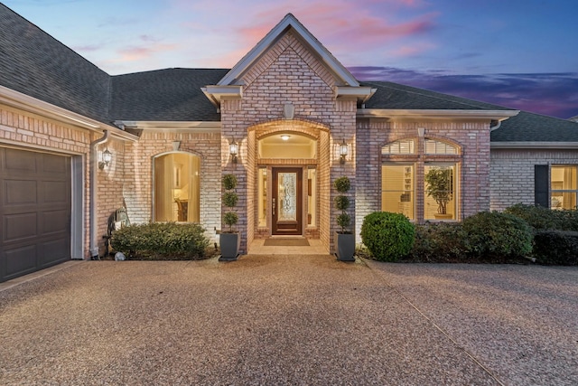 view of front of property featuring a garage