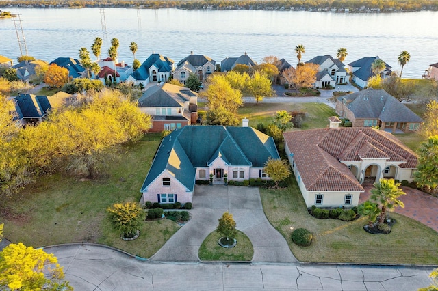 bird's eye view with a water view