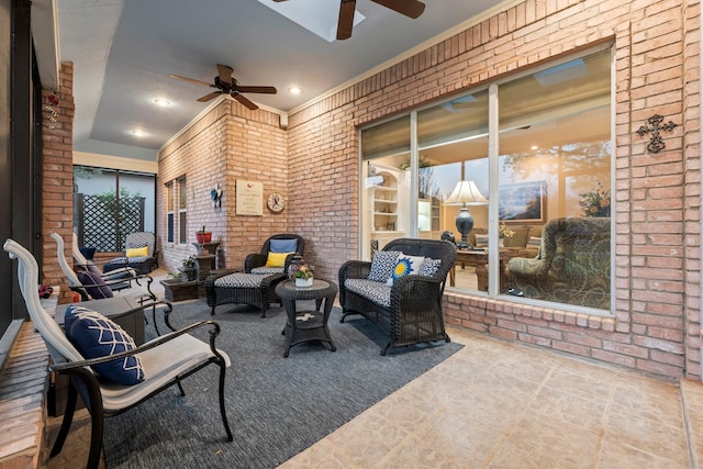 view of patio featuring ceiling fan and an outdoor hangout area