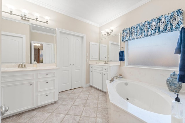 bathroom featuring tile patterned floors, crown molding, vanity, and a relaxing tiled tub