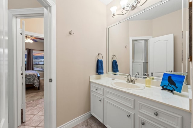 bathroom featuring vanity, tile patterned floors, and ceiling fan