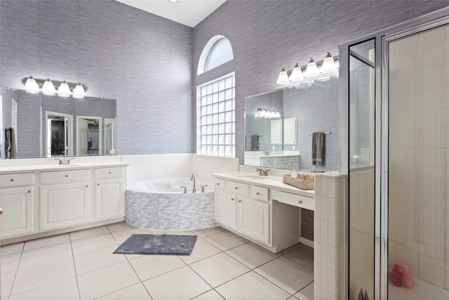 bathroom featuring vanity, separate shower and tub, and tile patterned floors