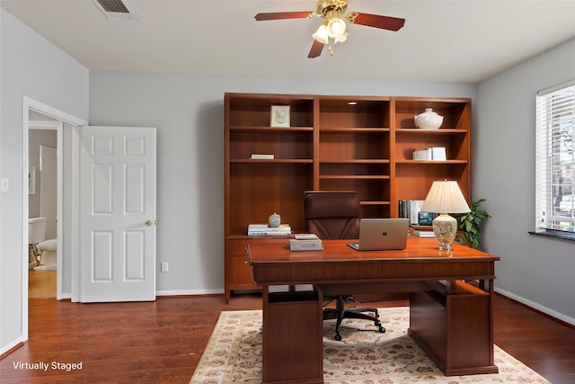 office area featuring ceiling fan and dark hardwood / wood-style flooring