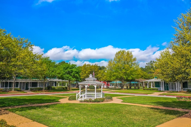 view of community featuring a gazebo and a lawn