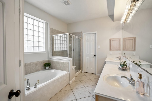 bathroom with vanity, separate shower and tub, and tile patterned flooring