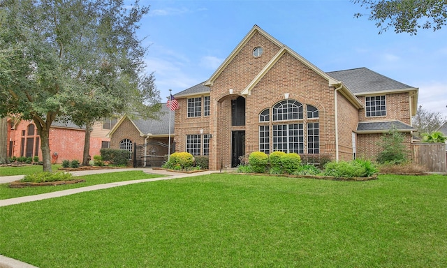 front facade featuring a front lawn