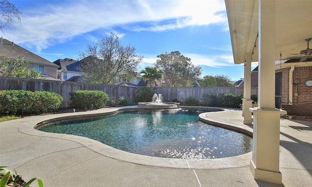 view of pool featuring a patio area and ceiling fan