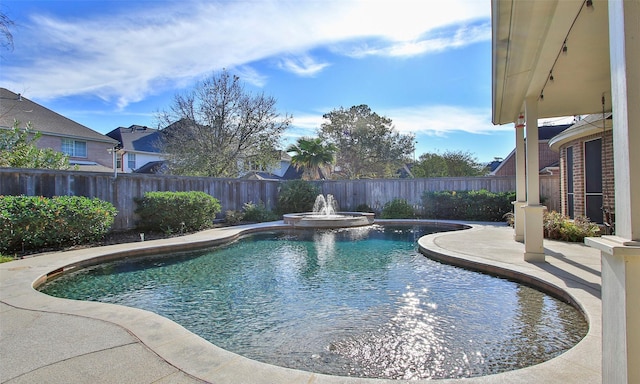 view of pool featuring a patio