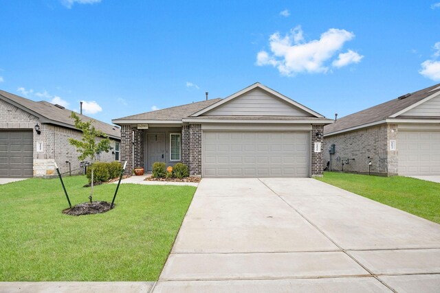 ranch-style home with a front yard and a garage