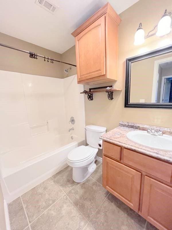 full bathroom featuring shower / bathing tub combination, vanity, and toilet