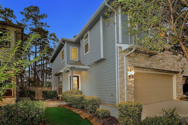 view of front of home with a garage