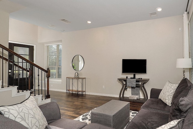 living room with dark hardwood / wood-style floors