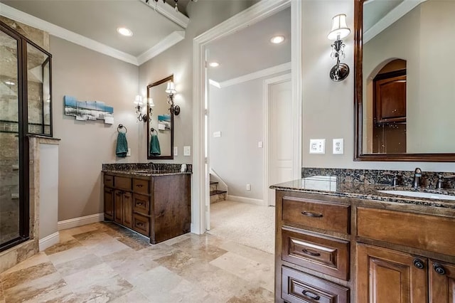 bathroom with crown molding, vanity, and walk in shower