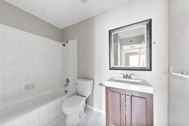 full bathroom with toilet, vanity, tile patterned floors, and tiled shower / bath