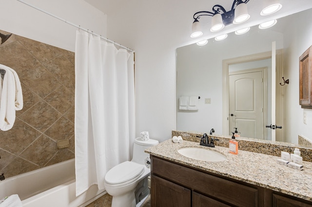 full bathroom with vanity, toilet, and shower / tub combo