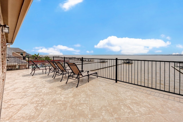 view of patio / terrace with a water view