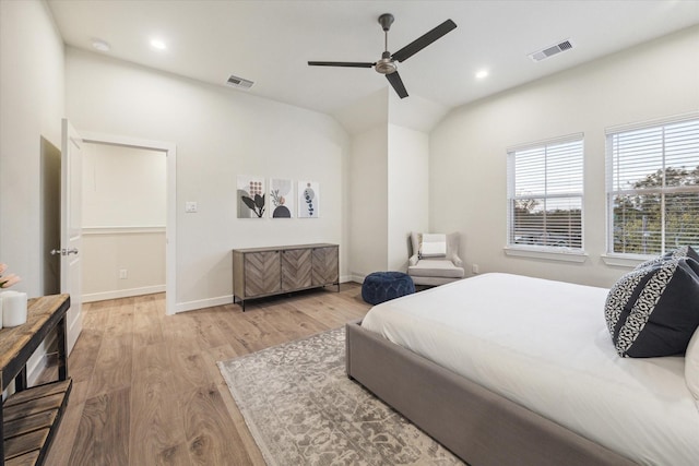 bedroom with ceiling fan and light hardwood / wood-style floors