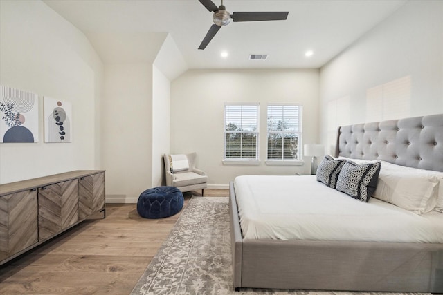 bedroom with ceiling fan and light hardwood / wood-style flooring