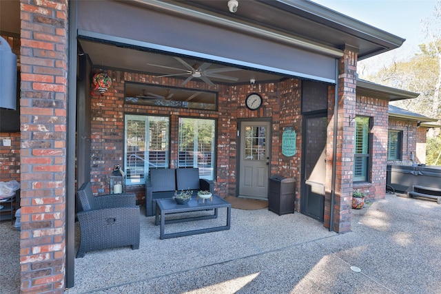 view of patio featuring an outdoor hangout area and ceiling fan