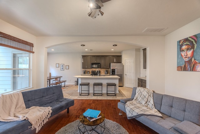 living room with light hardwood / wood-style flooring