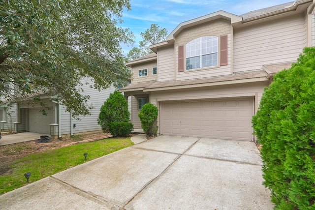 view of front of house with driveway and an attached garage