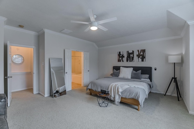 bedroom featuring ensuite bath, ceiling fan, a walk in closet, light carpet, and ornamental molding