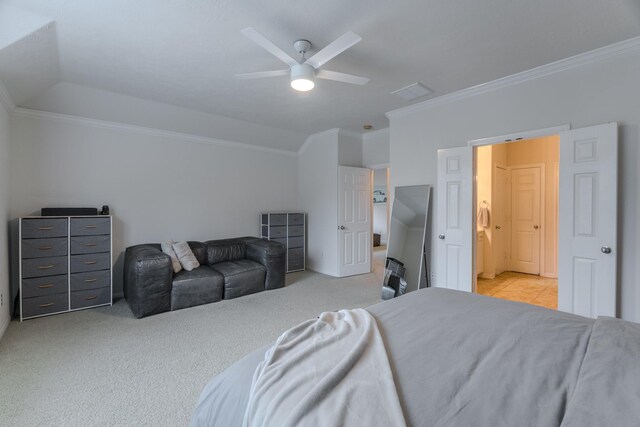 bedroom with light carpet, connected bathroom, ceiling fan, and ornamental molding