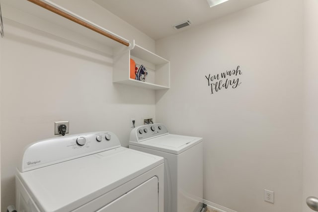 washroom with washer and clothes dryer