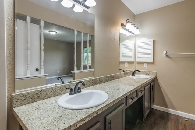 bathroom with wood-type flooring and vanity