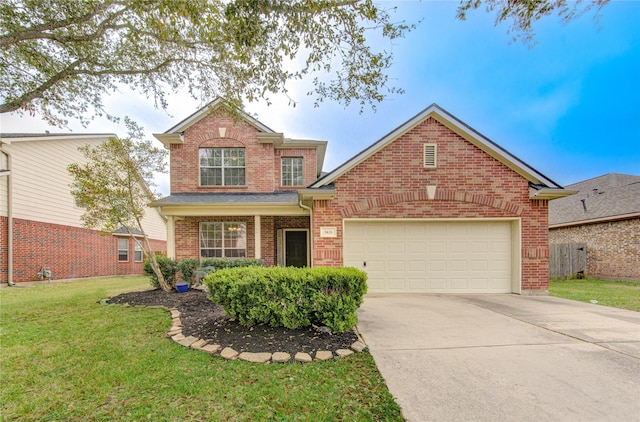 front of property with a garage and a front yard