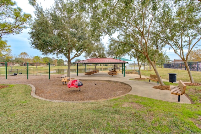 view of playground featuring a gazebo and a lawn