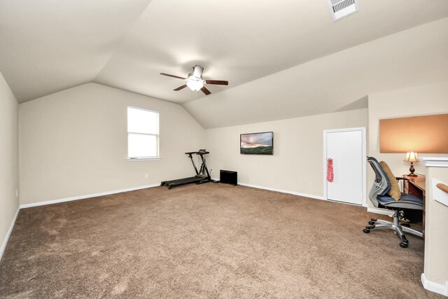 unfurnished office featuring carpet floors, ceiling fan, and lofted ceiling