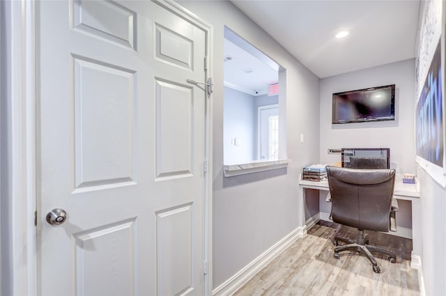 office space with light hardwood / wood-style flooring