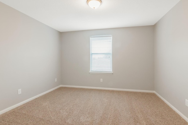 unfurnished room with carpet floors