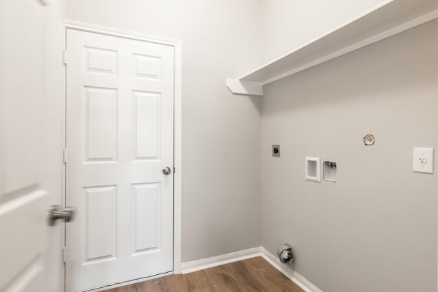 laundry area featuring gas dryer hookup, washer hookup, dark hardwood / wood-style floors, and hookup for an electric dryer