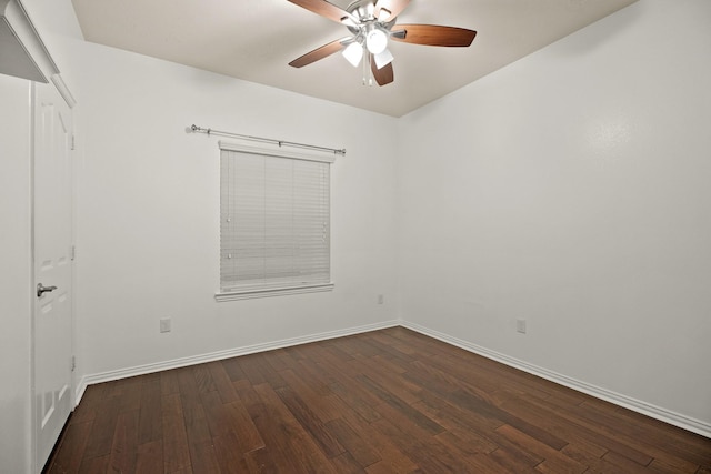 unfurnished room with dark hardwood / wood-style floors and ceiling fan