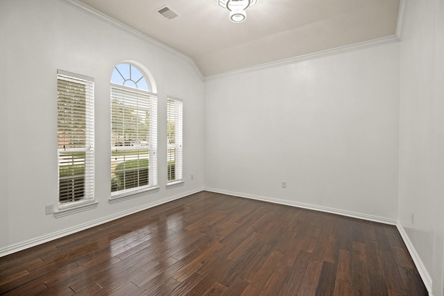 unfurnished room featuring dark hardwood / wood-style floors and vaulted ceiling