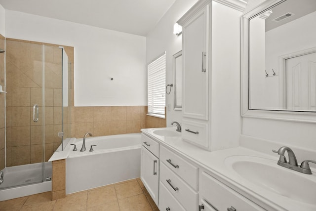 bathroom with vanity, separate shower and tub, and tile patterned floors