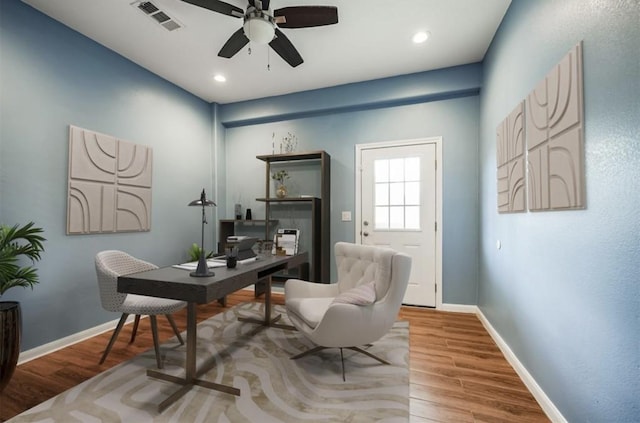 office featuring ceiling fan and wood-type flooring