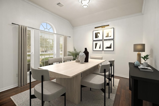 dining area with dark hardwood / wood-style floors and ornamental molding