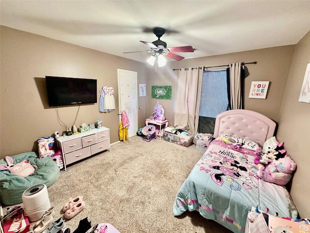 carpeted bedroom featuring ceiling fan