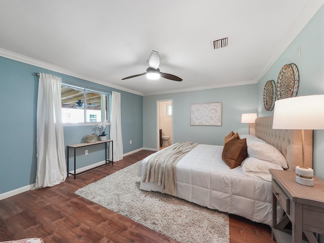 bedroom with dark hardwood / wood-style floors, ensuite bath, ceiling fan, and ornamental molding