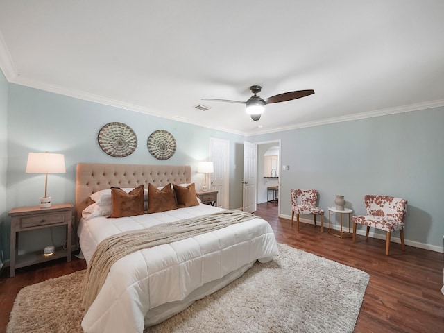 bedroom featuring dark wood-type flooring, ceiling fan, and crown molding