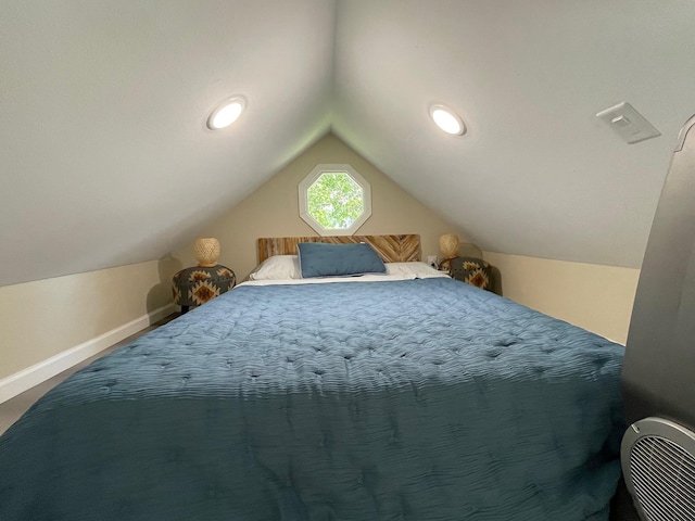 bedroom with vaulted ceiling