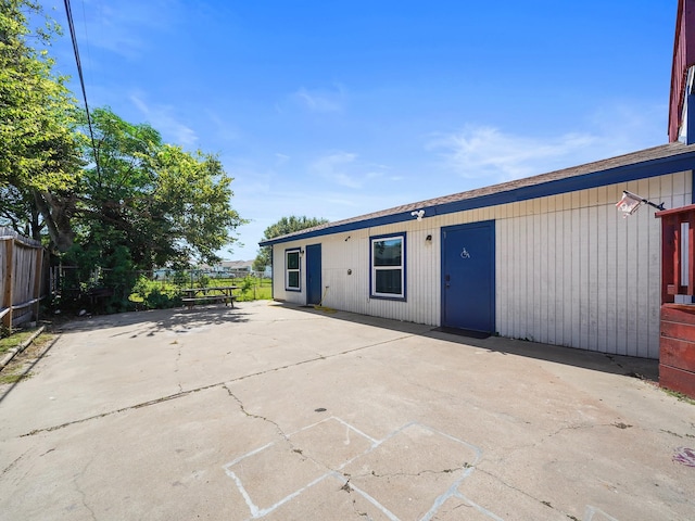 rear view of property with a patio area