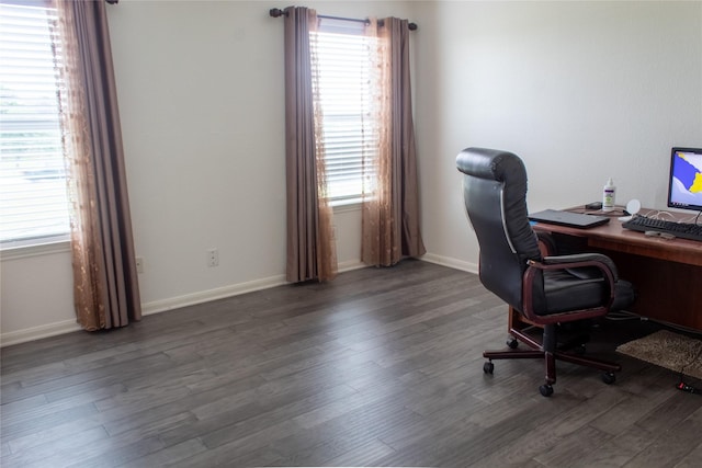 office with dark hardwood / wood-style floors